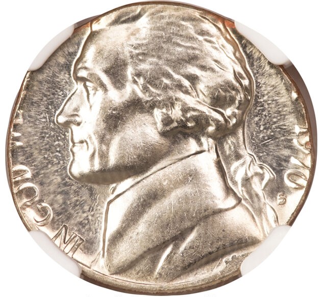 1970 nickel struck on wrong planchet error showing copper color and smaller size than standard nickel
